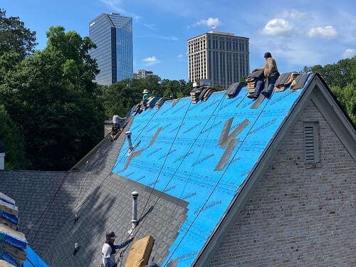 Northpoint Roofing Contractor team on a roof doing a complete replacement.
